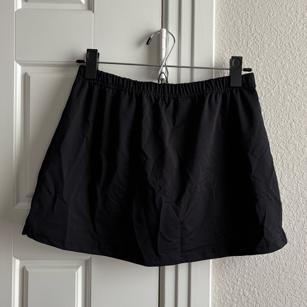 Augusta Sportswear mini skort; black (size M)